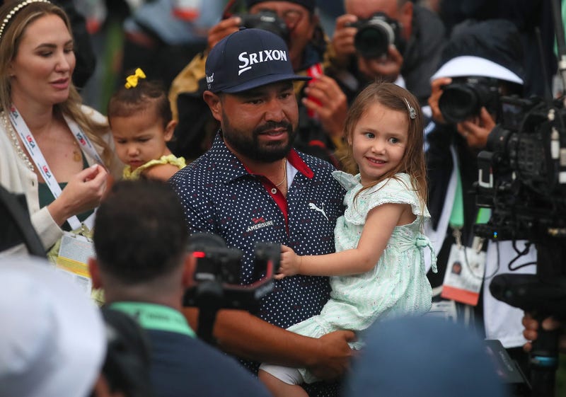JJ Spaun with his daughter after winning US Open