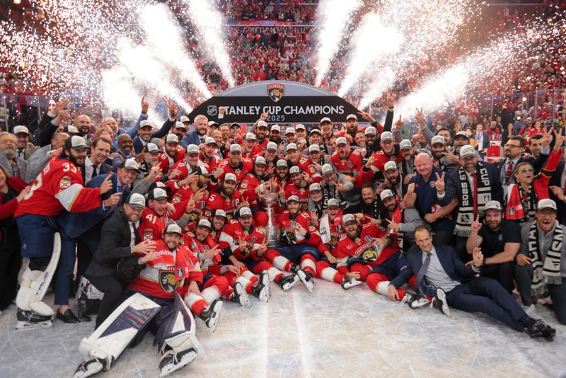 The Florida Panthers pose for a photo with the Stanley Cup