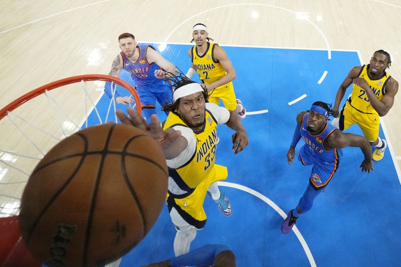 Jun 22, 2025; Oklahoma City, Oklahoma, USA; Indiana Pacers center Myles Turner (33) reaches for the ball against the Oklahoma City Thunder during the first half of game seven of the 2025 NBA Finals at Paycom Center. Mandatory Credit: Kyle Terada-Imagn Images