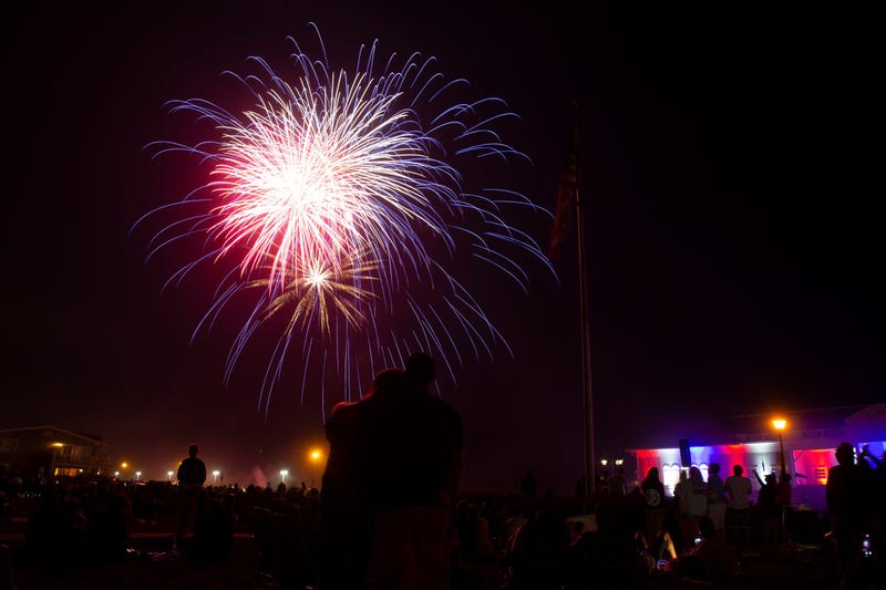 A patriotic light show and firework display takes place at the Taylor Pavilion to celebrate the Fourth of July in Belmar, New Jersey, on Saturday, July 6, 2024.