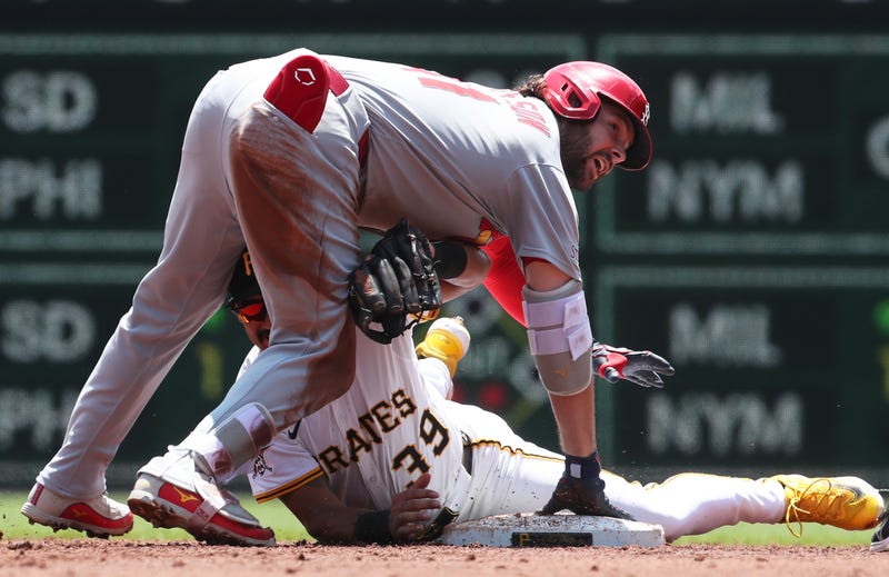 St. Louis Cardinals first baseman Alec Burleson (41) arrives at second base with a double as Pittsburgh Pirates second baseman Nick Gonzales (39) applies a late tag during the third inning at PNC Park.