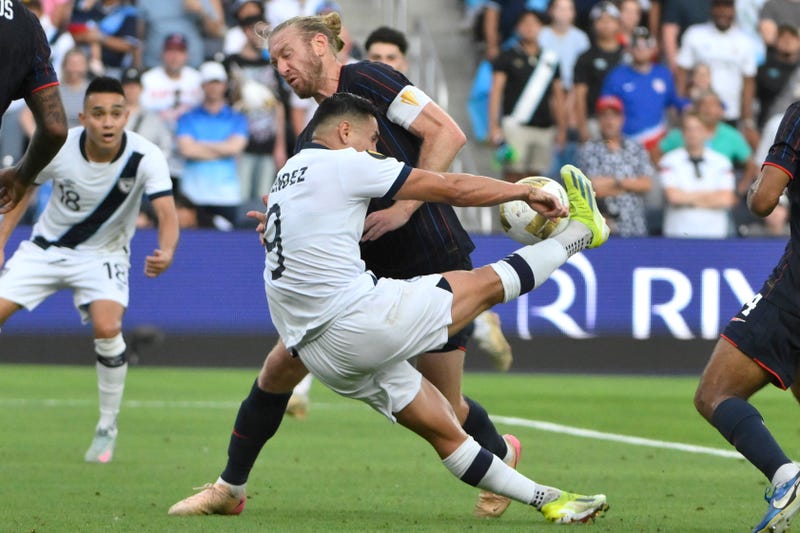 Guatemala forward Rubio Rubin (9) controls the ball against United States of America defender Tim Ream (13) in the first half during a semifinal match of the 2025 Gold Cup at Energizer Park.