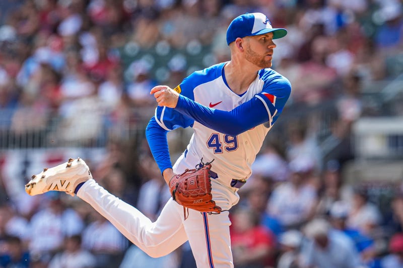 Atlanta Braves pitcher Aaron Bummer (49) pitches against the Baltimore Orioles during the first inning at Truist Park.