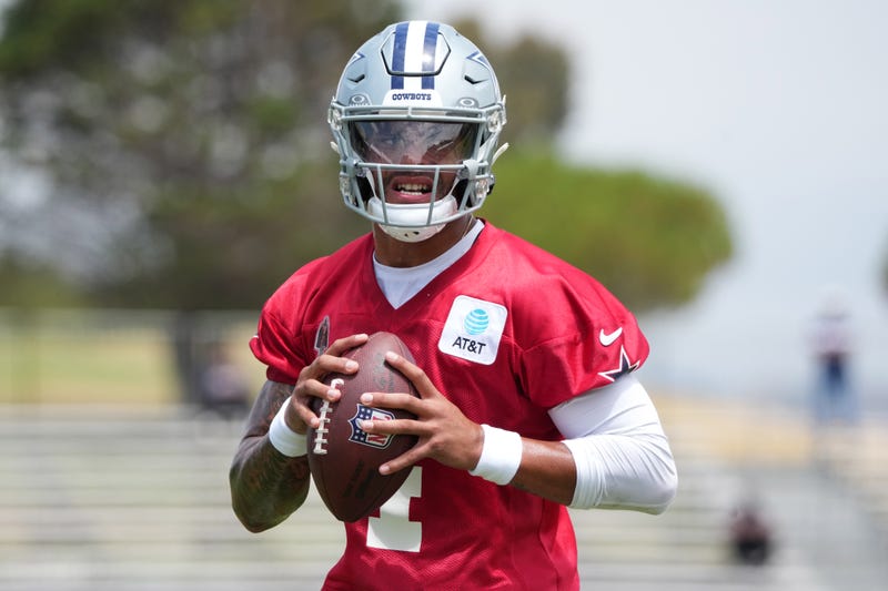 Dallas Cowboys quarterback Dak Prescott (4) throws the ball during training camp at the River Ridge Fields.