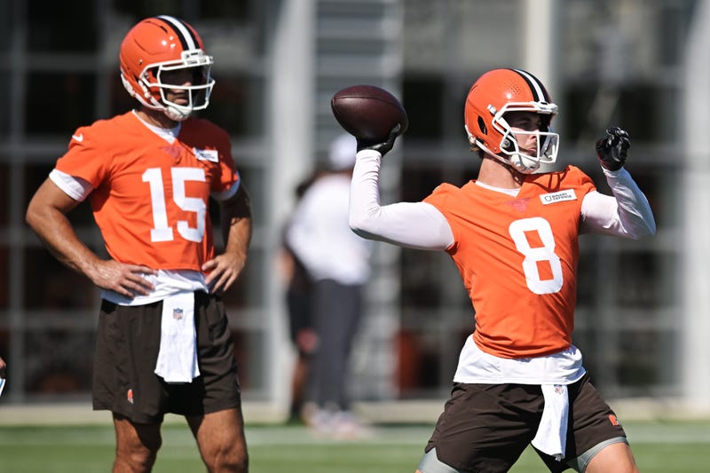 Jul 23, 2025; Berea, OH, USA; Cleveland Browns quarterback Kenny Pickett (8) throws a pass as quarterback Joe Flacco (15) looks on during training camp at CrossCountry Mortgage Campus.