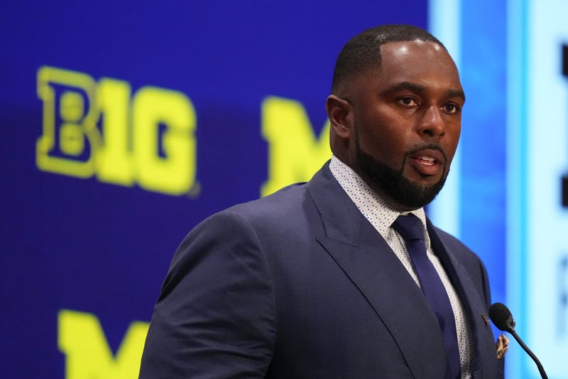 Jul 24, 2025; Las Vegas, NV, USA; Michigan head coach Sherrone Moore speaks to the media during the Big Ten NCAA college football media days at Mandalay Bay Resort. Mandatory Credit: Lucas Peltier-Imagn Images