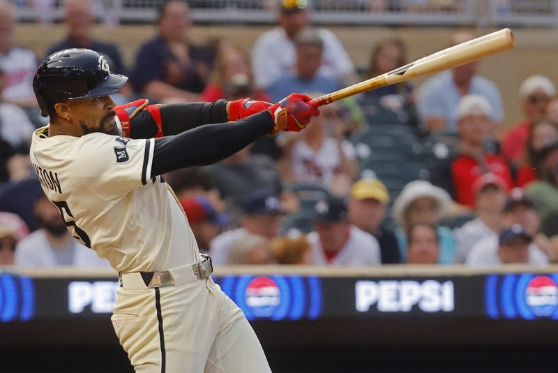 Minnesota Twins center fielder Byron Buxton (25) hits a sacrifice fly against the Washington Nationals in the fifth inning at Target Field. The Twins have placed Buxton in the Injured List with a rib injury.