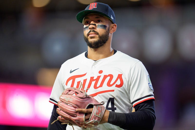 Now former Minnesota Twins shortstop Carlos Correa (4) walks to the dugout after the ninth inning against the Washington Nationals at Target Field. 