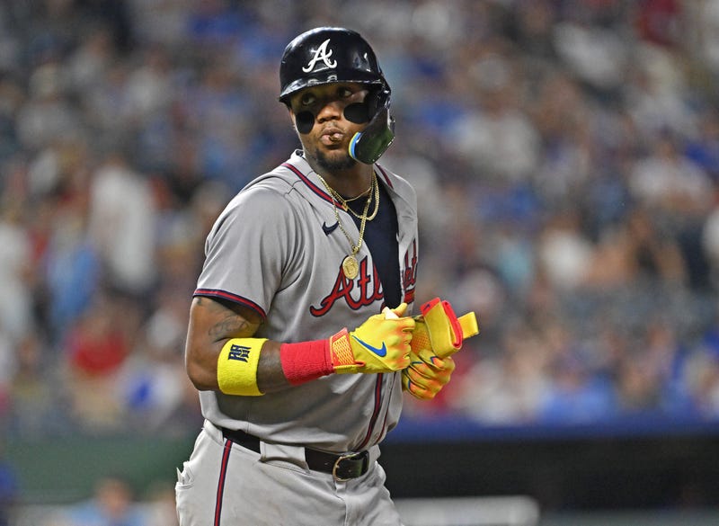 Atlanta Braves right fielder Ronald Acuna Jr. (13) looks toward the Kansas City Royals dugout after getting walked in the ninth inning at Kauffman Stadium.