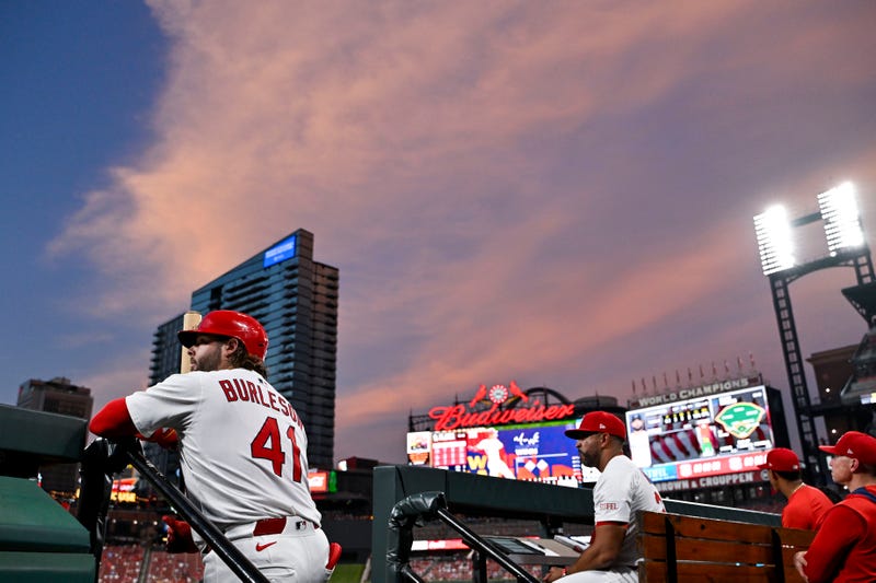 St. Louis Cardinals left fielder Alec Burleson (41) looks on from the dugout during the fifth inning against the Miami Marlins at Busch Stadium.