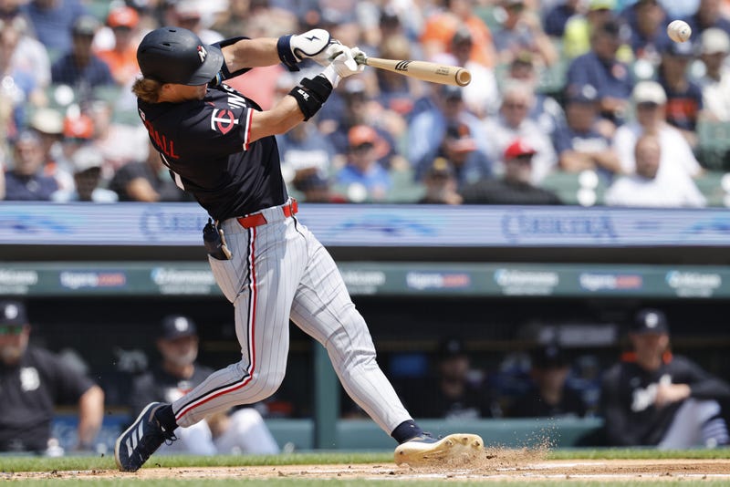Minnesota Twins second baseman Luke Keaschall (15) hits a two run hits an RBI double in the first inning against the Detroit Tigers at Comerica Park.