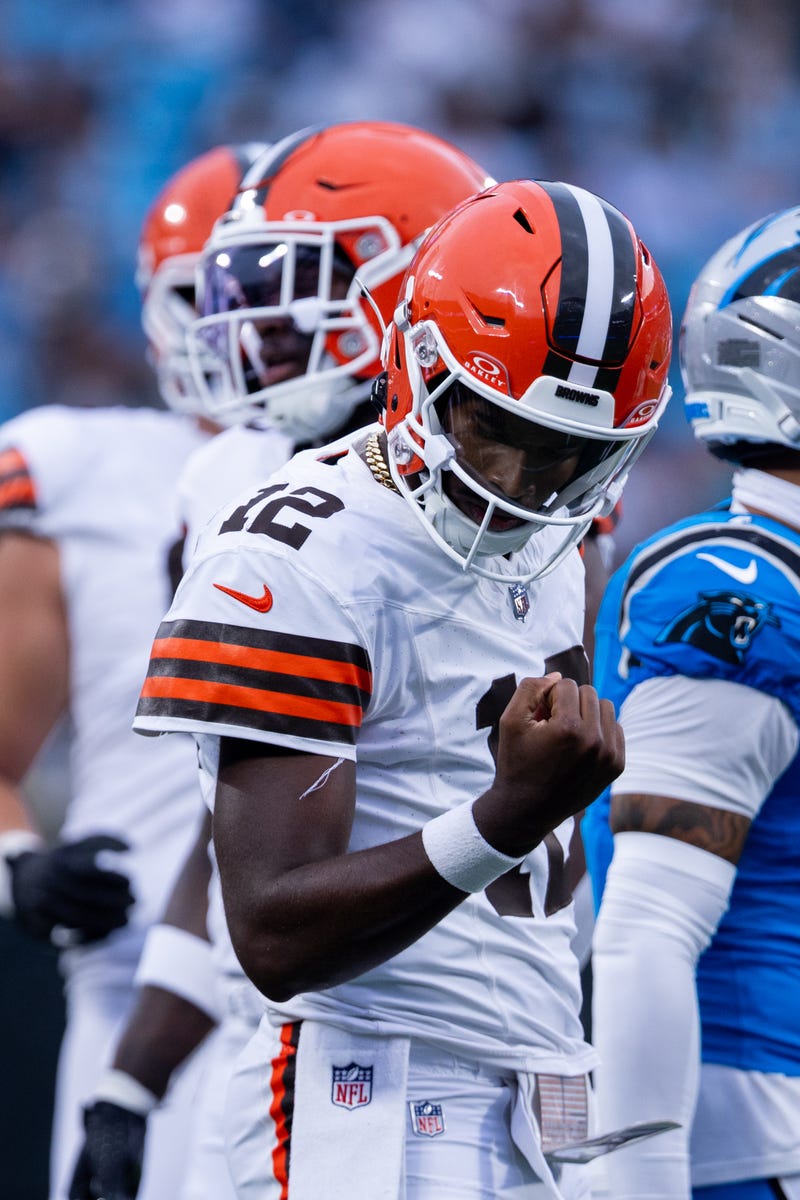 Aug 8, 2025; Charlotte, North Carolina, USA; Cleveland Browns quarterback Shedeur Sanders (12) celebrates a first down against the Carolina Panthers during the first quarter at Bank of America Stadium.