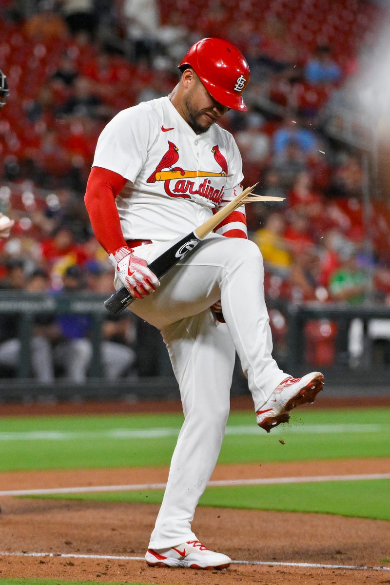 St. Louis Cardinals first baseman Willson Contreras (40) breaks his bat over his knee after he was hit by a pitch from Colorado Rockies starting pitcher Kyle Freeland (not pictured) during the fourth inning at Busch Stadium.