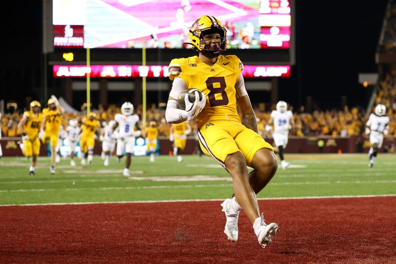Minnesota Golden Gophers wide receiver Jalen Smith (8) runs the ball after a catch for a touchdown against the Buffalo Bulls during the second half of the game at Huntington Bank Stadium.