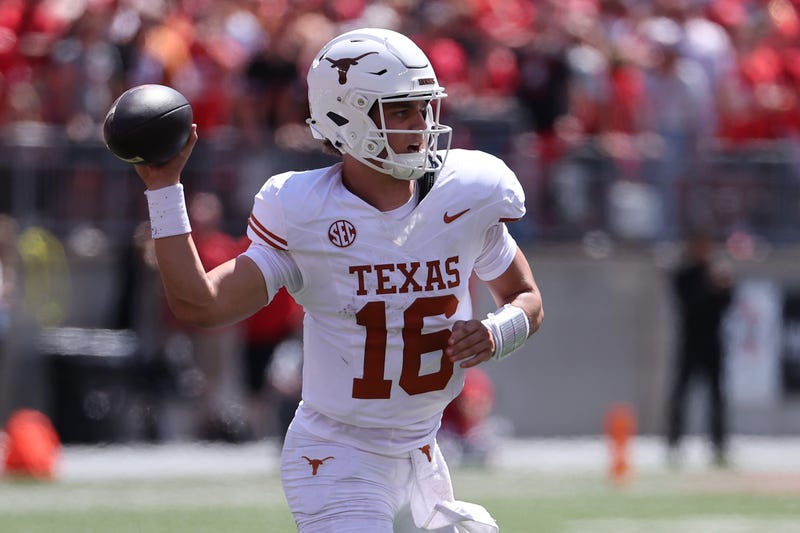 Aug 30, 2025; Columbus, Ohio, USA; Texas Longhorns quarterback Arch Manning (16) drops back to pass against the Ohio State Buckeyes in the first half at Ohio Stadium. Mandatory Credit: Joseph Maiorana-Imagn Images
