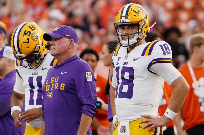 LSU coach Brian kelly next to quarterback Garrett Nussmeier
