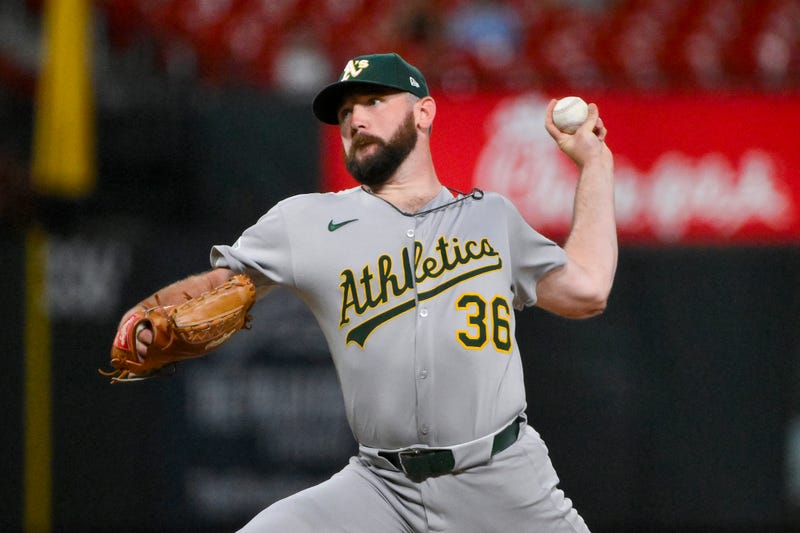 Athletics relief pitcher Hogan Harris (36) pitches against the St. Louis Cardinals during the sixth inning at Busch Stadium. Mandatory Credit: Jeff Curry-Imagn Images