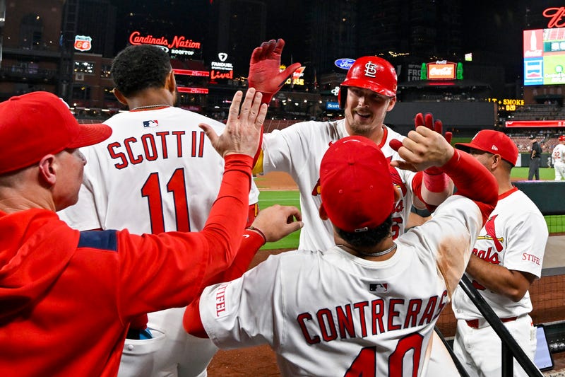 St. Louis Cardinals third baseman Nolan Gorman (16) celebrates with teammates after hitting a solo home run against the Athletics during the seventh inning at Busch Stadium.
