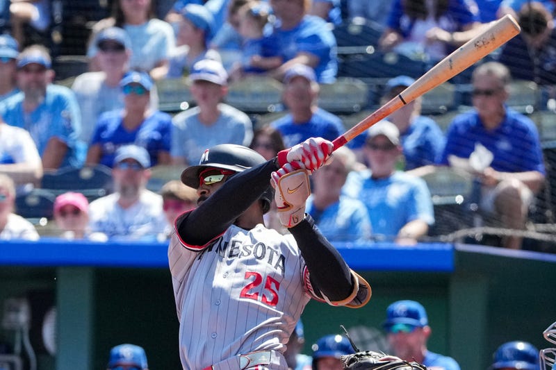 Minnesota Twins center fielder Byron Buxton (25) hits a solo home run against the Kansas City Royals during the first inning at Kauffman Stadium.