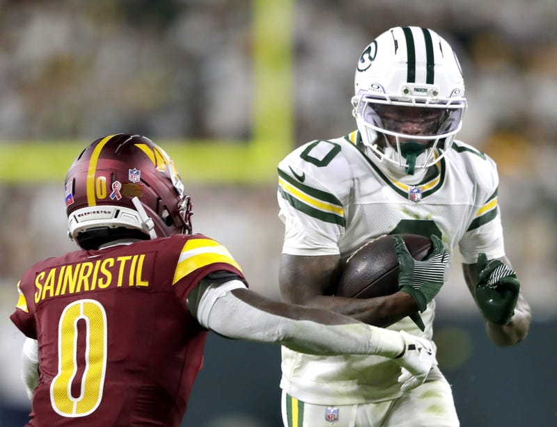 Sep 11, 2025; Green Bay, Wisconsin, USA; Green Bay Packers wide receiver Matthew Golden (0) runs against the Washington Commanders cornerback Mike Sainristil (0) at Lambeau Field. Mandatory Credit: Wm. Glasheen-USA TODAY Network via Imagn Images