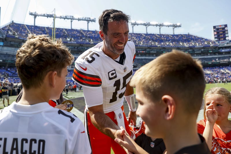 Joe Flacco with kids in Cleveland