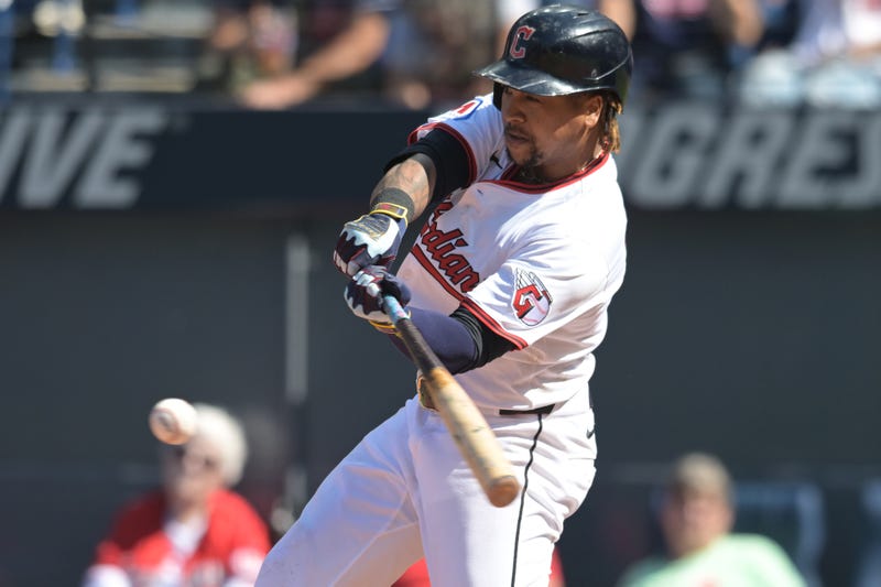 Cleveland Guardians designated hitter Jose Ramirez (11) hits a single against the Chicago White Sox during the fourth inning at Progressive Field.