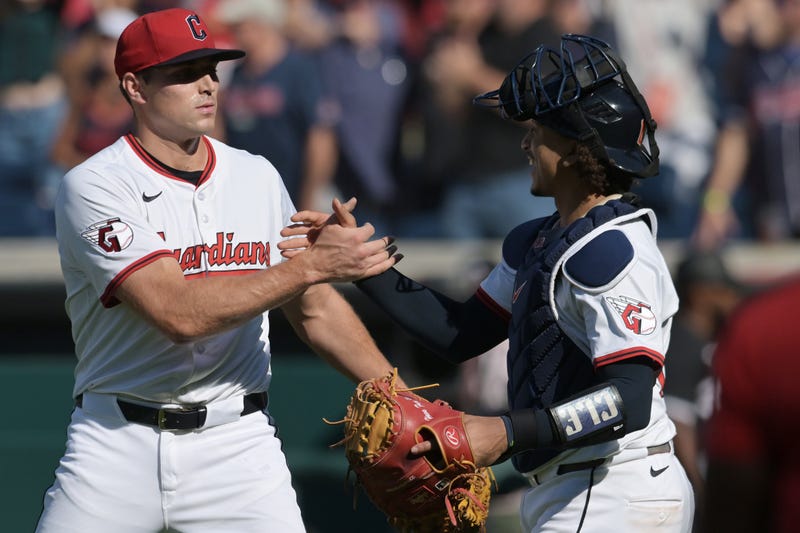 Sep 14, 2025; Cleveland, Ohio, USA; Cleveland Guardians relief pitcher Cade Smith (36) and catcher Bo Naylor (23) celebrate after the Guardians beat the Chicago White Sox at Progressive Field.