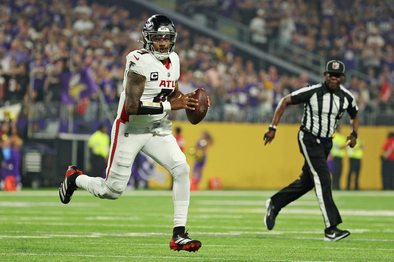 Sep 14, 2025; Minneapolis, Minnesota, USA; Atlanta Falcons quarterback Michael Penix Jr. (9) looks to make a pass during the first half against the Minnesota Vikings at U.S. Bank Stadium. Mandatory Credit: Matt Krohn-Imagn Images