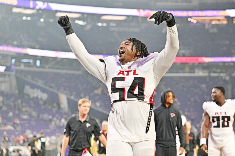 Sep 14, 2025; Minneapolis, Minnesota, USA; Atlanta Falcons defensive tackle Brandon Dorlus (54) celebrates after the game against the Minnesota Vikings at U.S. Bank Stadium. Mandatory Credit: Jeffrey Becker-Imagn Images
