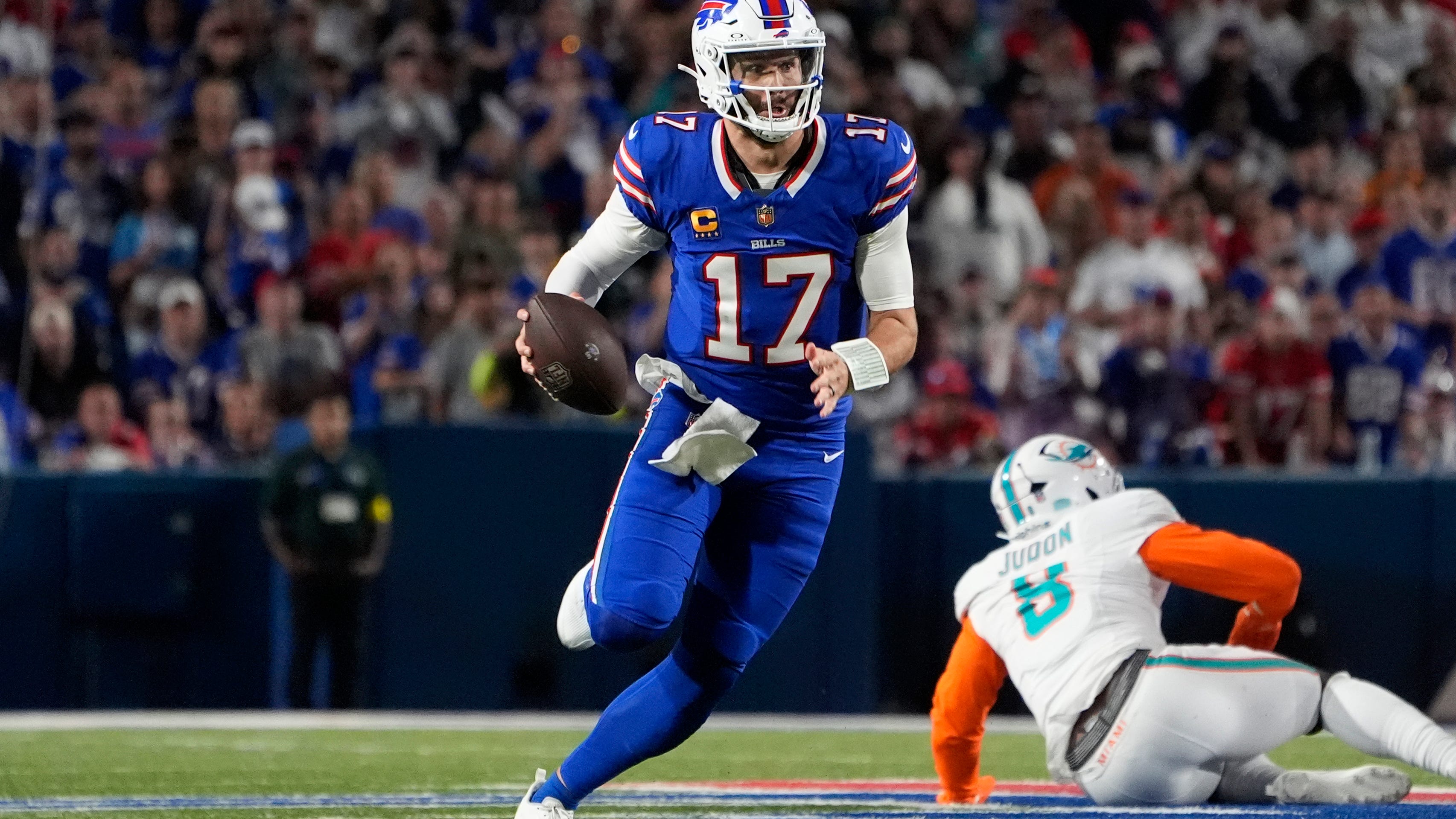 Allen's three touchdown passes, Bernard's pick secure Bills' 31-21 win over spiraling Dolphins