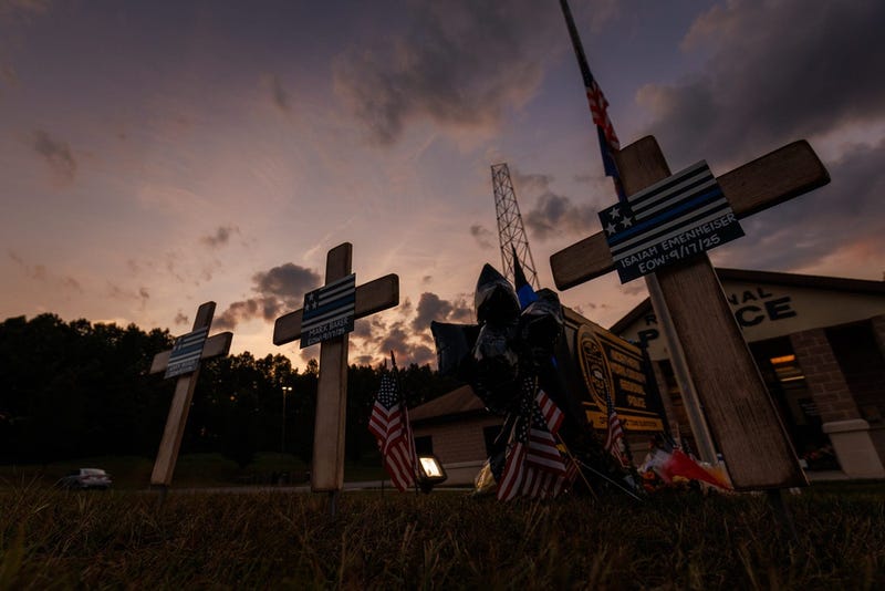 Memorial crosses are seen for three fallen Northern York County Regional Police Department officers outside of the department's David Tome Substation, Friday, Sept. 19, 2025, in Heidelberg Township. Detective Mark Baker, Detective Sergeant Cody Becker and Detective Isaiah Emenheiser were killed, and two more officer were wounded, by a gunman in an ambush on Wednesday, Sept. 17, 2025 in North Codorus Township.