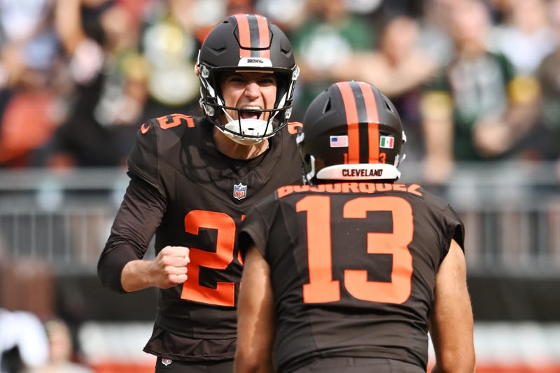 Sep 21, 2025; Cleveland, Ohio, USA; Cleveland Browns place kicker Andre Szmyt (25) and holder Corey Bojorquez (13) celebrate after Szmyt made a 55 yard field goal as time expired to beat the Green Bay Packers at Huntington Bank Field.
