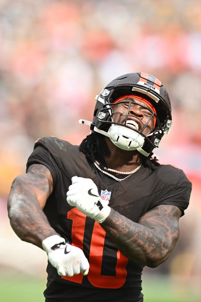 Sep 21, 2025; Cleveland, Ohio, USA; Cleveland Browns running back Quinshon Judkins (10) celebrates after scoring a touchdown against the Green Bay Packers during the fourth quarter at Huntington Bank Field. 