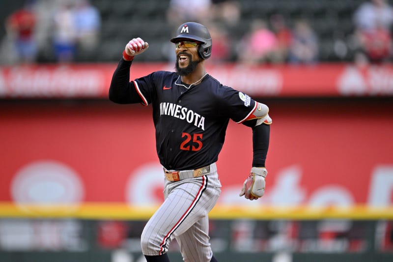 Minnesota Twins center fielder Byron Buxton (25) celebrates as he rounds the bases after hitting a three run home run against the Texas Rangers during the eighth inning at Globe Life Field. 