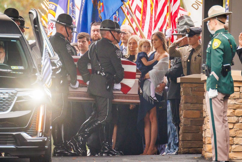 The caskets of the three fallen York County officers are taken into the Living Word Community Church in Red Lion, PA on Thursday, Sept. 25.