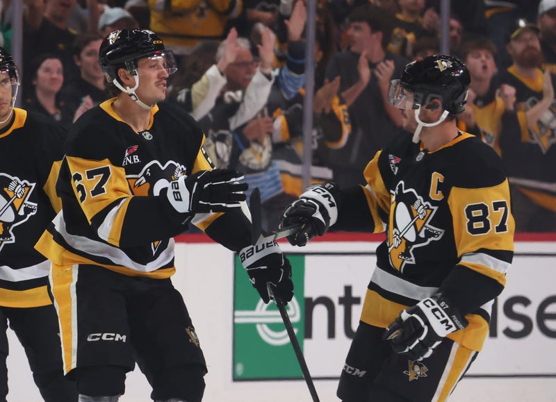 Sidney Crosby and Rickard Rakell