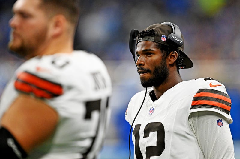 Sep 28, 2025; Detroit, Michigan, USA; Cleveland Browns quarterback Shedeur Sanders (12) looks on from he sidelines during the second half against the Detroit Lions at Ford Field. Mandatory Credit: Lon Horwedel-Imagn Images