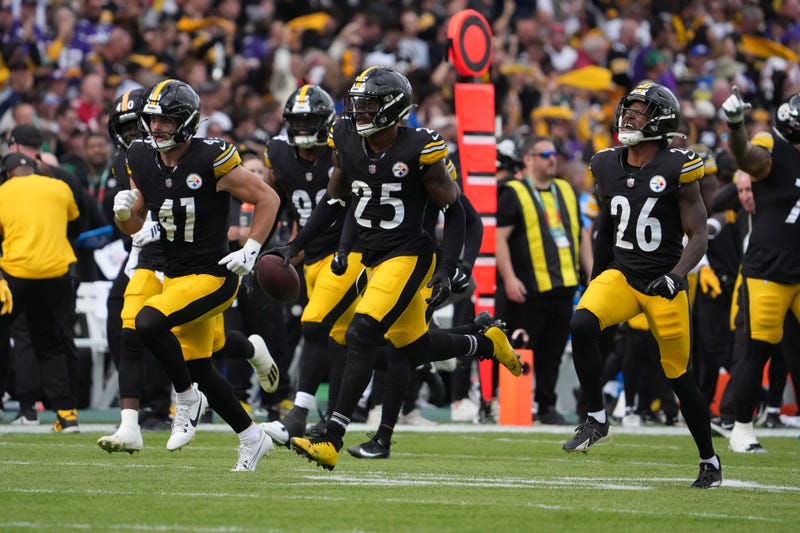 Steelers defenders celebrate interception