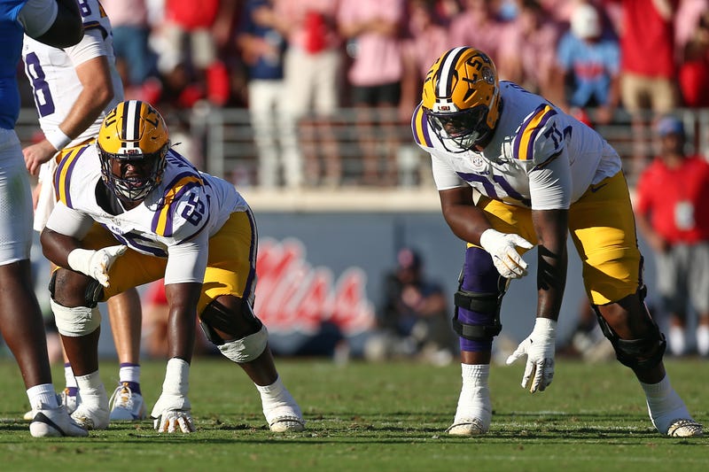 SU Tigers offensive lineman Paul Mubenga (65) and offensive lineman Tyree Adams (71)