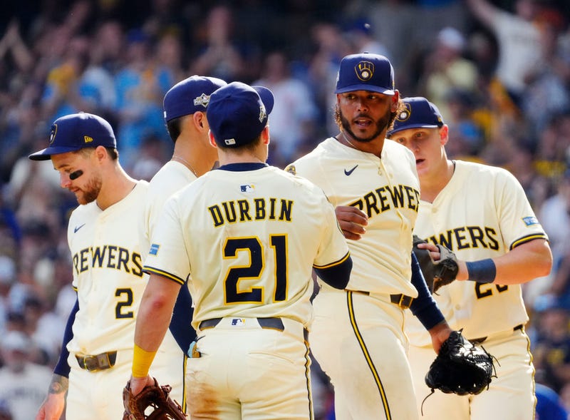 Milwaukee Brewers pitcher Freddy Peralta (51) departs for Milwaukee Brewers pitcher Aaron Ashby (26) during the sixth inning of their National League Division Series game on Saturday October 4, 2025 against the Milwaukee Brewers at American Family Field in Milwaukee, Wisconsin.