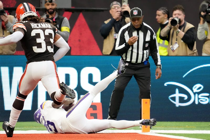 Minnesota Vikings wide receiver Jordan Addison (3) makes a catch for a touchdown against the Cleveland Browns during the fourth quarter of an NFL International Series game at Tottenham Hotspur Stadium.
