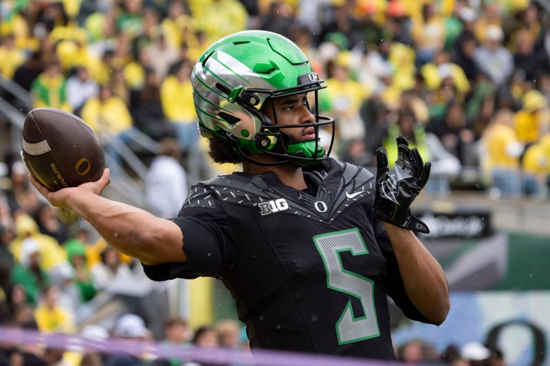 Oregon quarterback Dante Moore throws a pass during warmups as the Oregon Ducks host the Indiana Hoosiers Oct. 11, 2025, at Autzen Stadium in Eugene, Oregon.