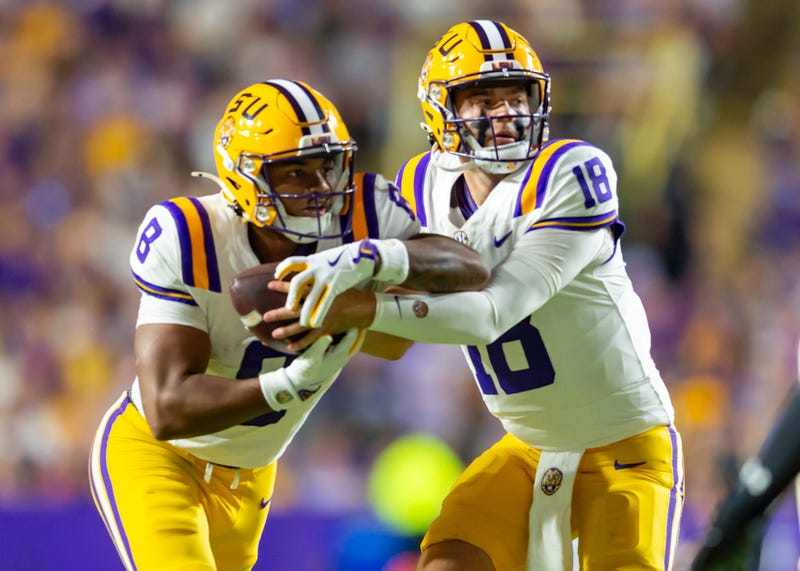 LSU quarterback Garrett Nussmeier and running back Ju'Juan Johnson