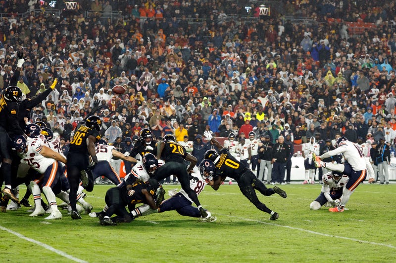 Bears kicker Jake Moody (16) kicks a game-winning field goal against the Washington Commanders during the fourth quarter at Northwest Stadium