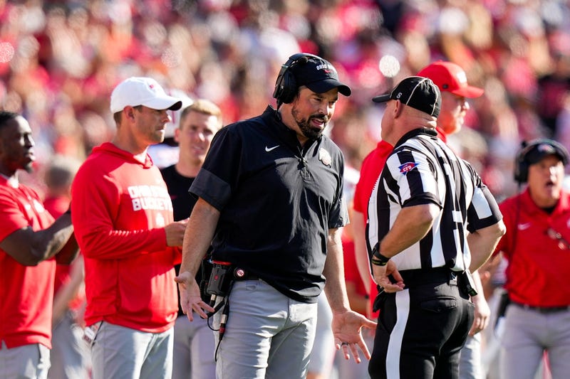 Ohio State Buckeyes head coach Ryan Day speaks to the referee in the second half at Camp Randall Stadium on Saturday, Oct. 18, 2025 in Madison, Wisconsin.
