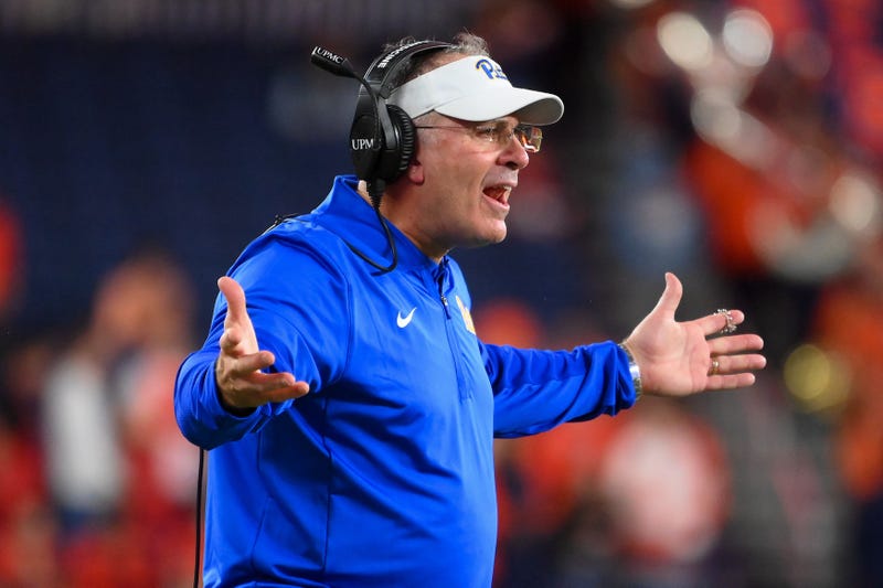Pat Narduzzi arms out on sidelines