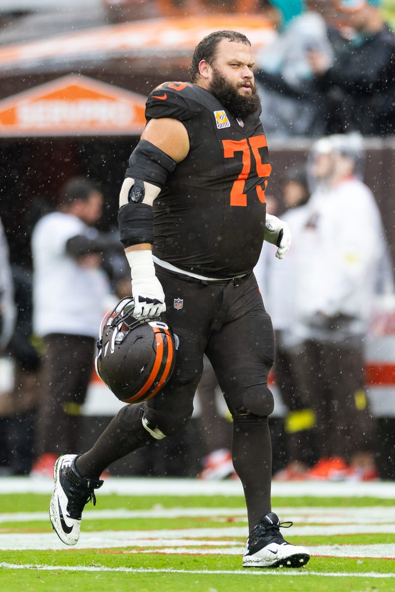 Oct 19, 2025; Cleveland, Ohio, USA; Cleveland Browns guard Joel Bitonio (75) runs off the field after warmups before the game against the Miami Dolphins at Huntington Bank Field. Mandatory Credit: Scott Galvin-Imagn Images