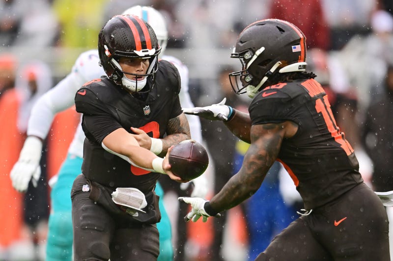 Oct 19, 2025; Cleveland, Ohio, USA; Cleveland Browns quarterback Dillon Gabriel (8) hands off to running back Quinshon Judkins (10) against the Miami Dolphins during the first quarter at Huntington Bank Field.