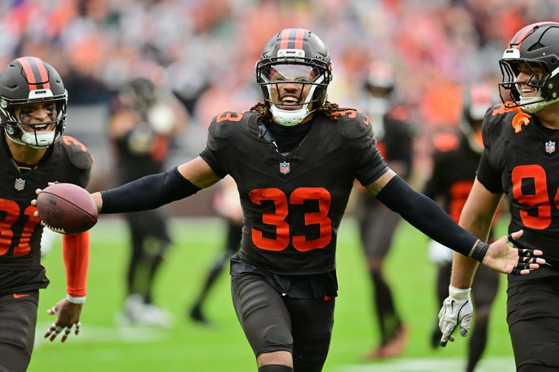 Cleveland Browns safety Ronnie Hickman Jr. (33) celebrates after intercepting a pass during the second half against the Miami Dolphins at Huntington Bank Field. 