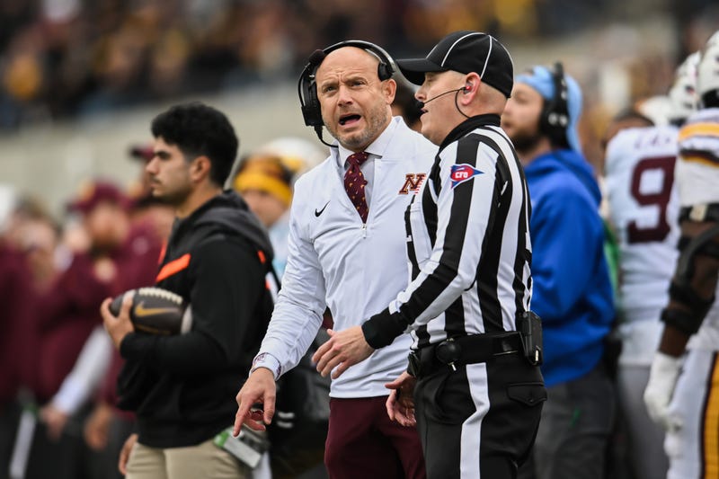 Minnesota Golden Gophers head coach P.J. Fleck reacts near a referee during the first quarter against the Iowa Hawkeyes at Kinnick Stadium.